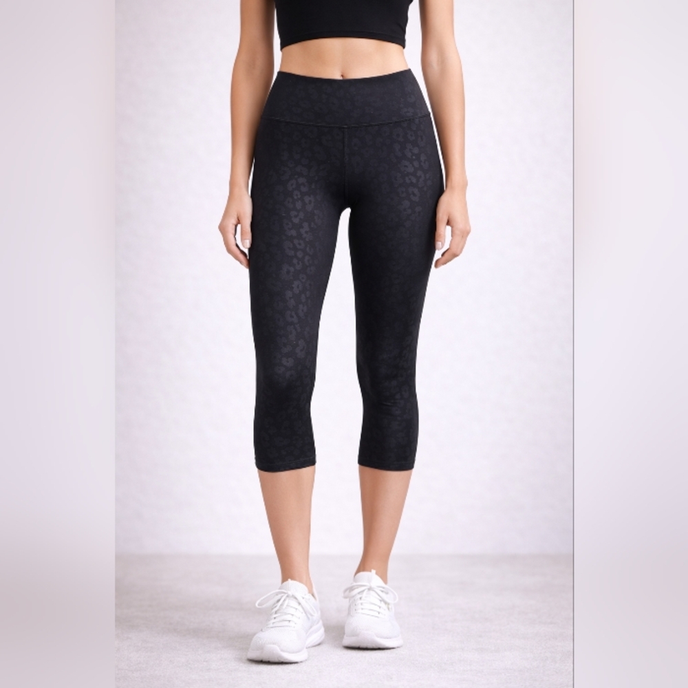 Evolution and Creation Black Animal Print Capris Leggings